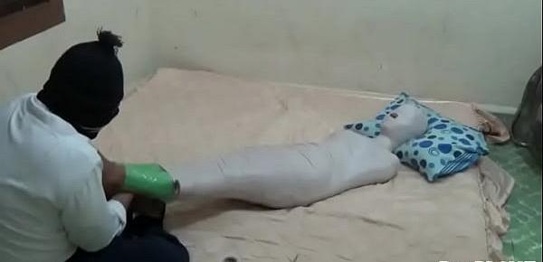  [Uncensored] A Young Girl Wrapped Into A Mummy and Helpless in The Bedroom